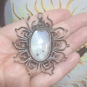 Elegant Sunburst Pendant with Moonstone